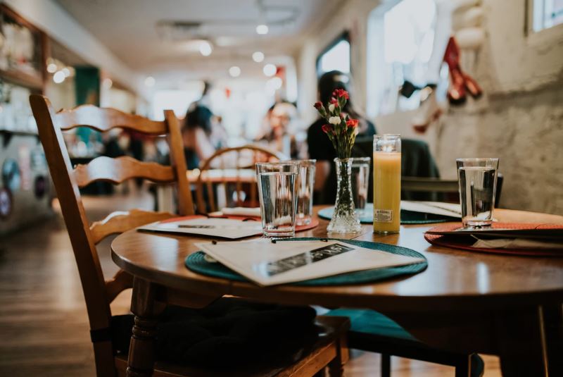 Restaurant table with drinks and a menu